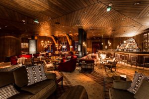 Restaurant and bar in a luxury French ski resort, La Mourra Hotel.
