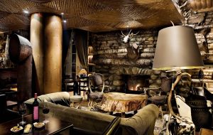 Wooden and stone furniture in French ski resort, Le Lodge Park Hotel.