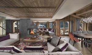 Fireplace and sofas in French ski chalet