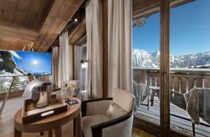 Bedroom view of mountains from a luxurious French ski resort