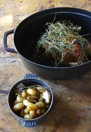 Potatoes and roast chicken at restaurant in French ski chalet, Les Fermes de Marie.