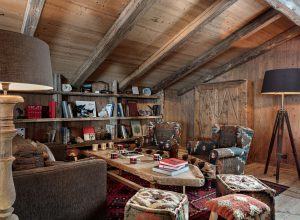 Patterned furniture in romantic living room in a French ski chalet.